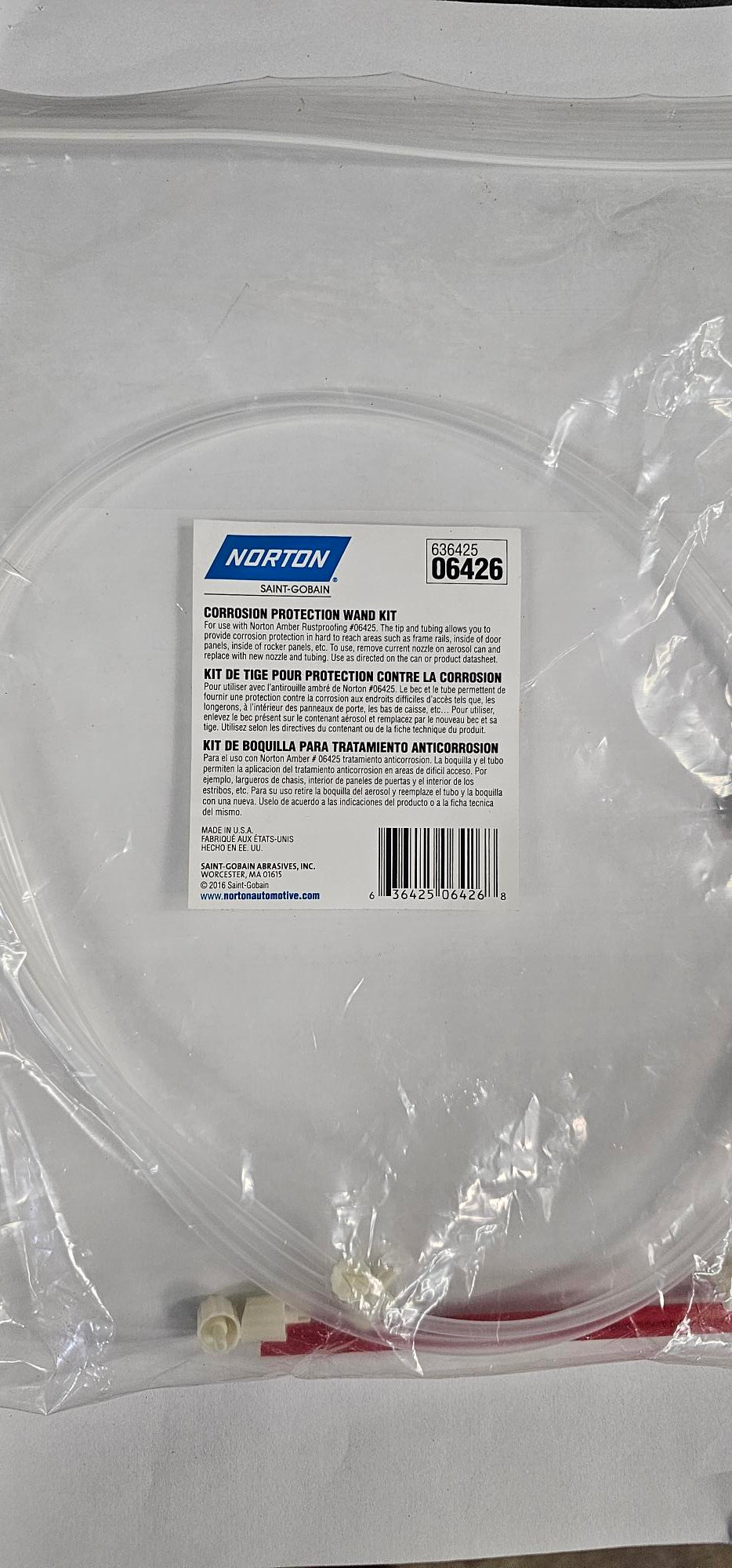 Norton security software package in clear plastic packaging on a white background