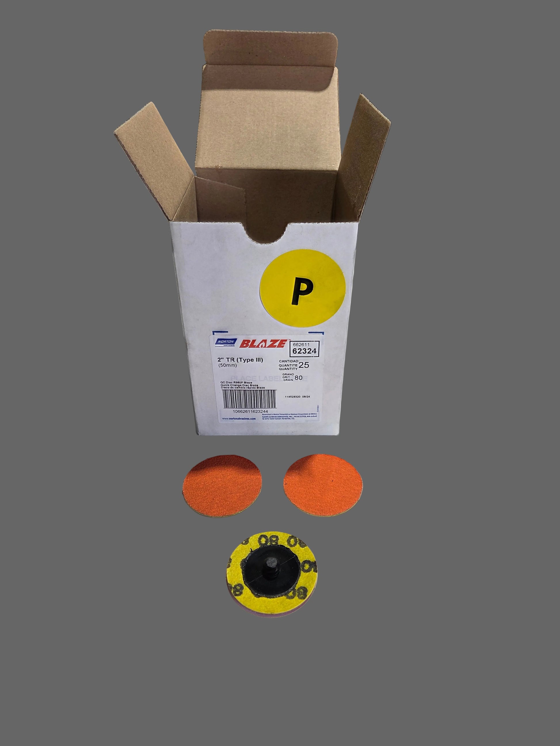 Box with a yellow label on a white surface in a warehouse setting