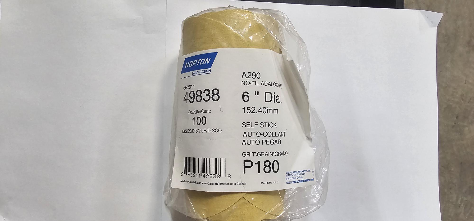 Packaged Norton sandpaper with a white background