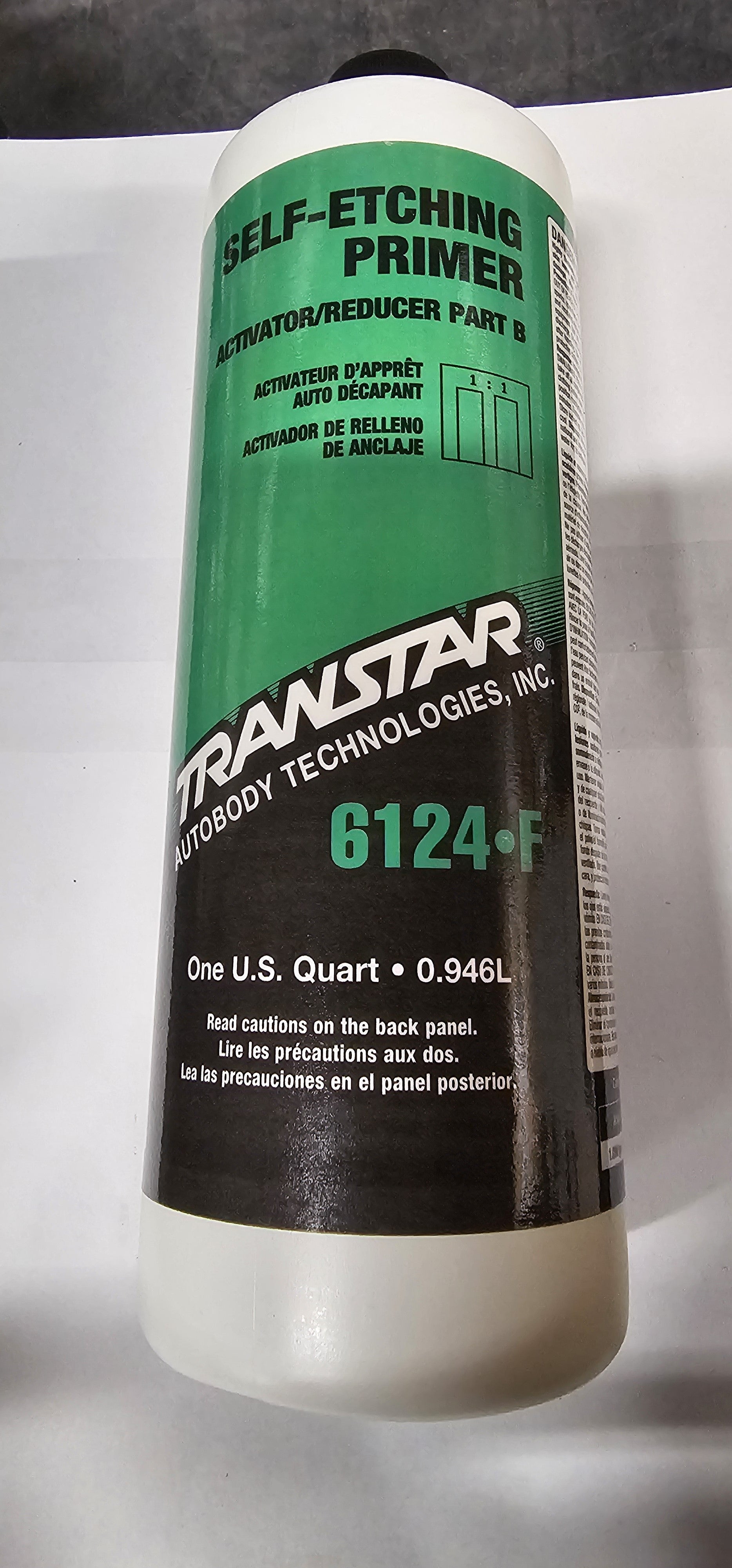 Can of Transtar self-etching primer on a white background