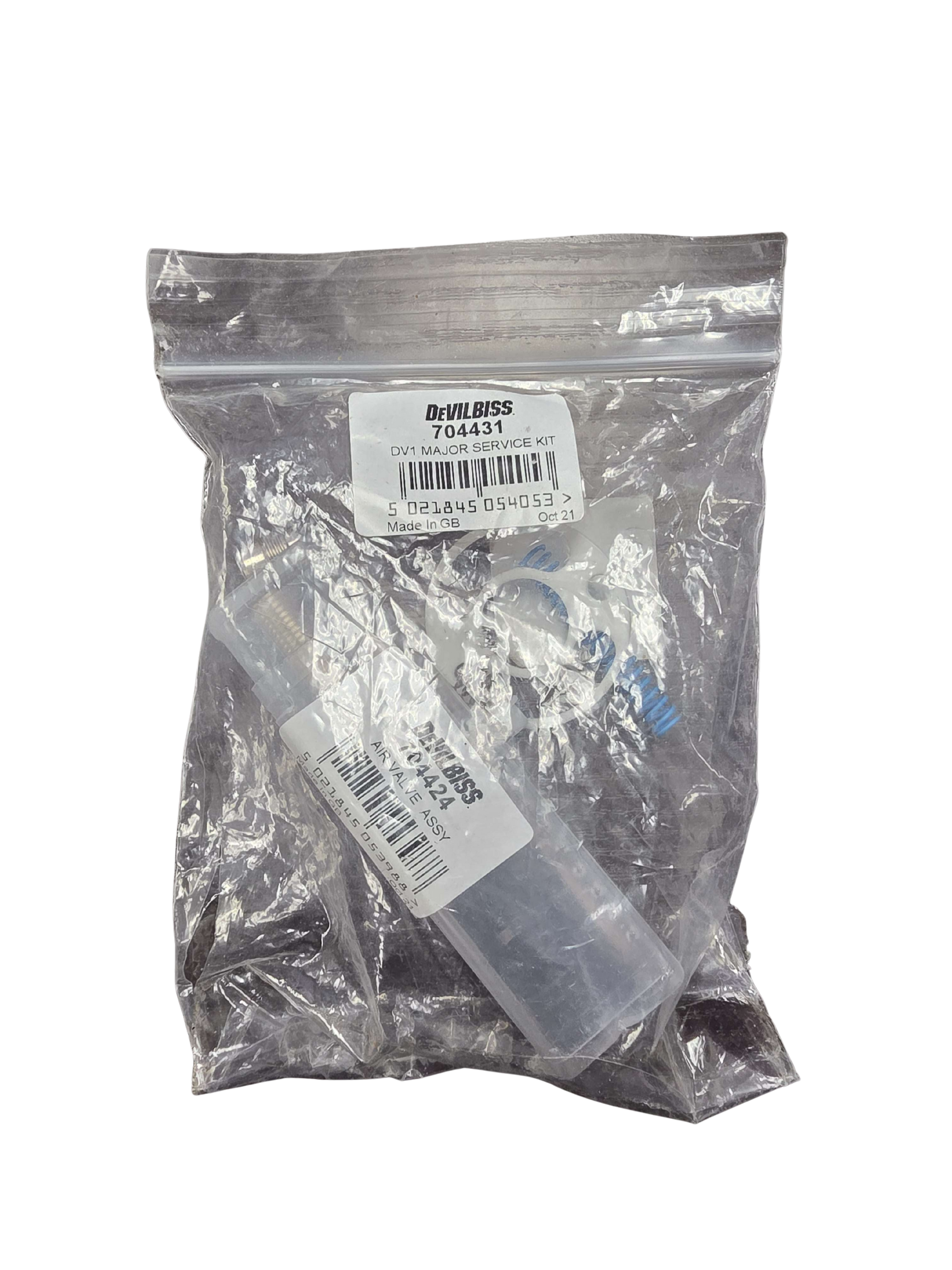 Clear plastic bag with medical devices inside on a white background