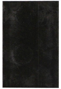 Black textured rug with a subtle pattern
