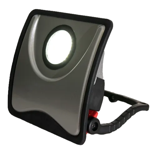 Portable floodlight with a black casing and visible light source on a white background