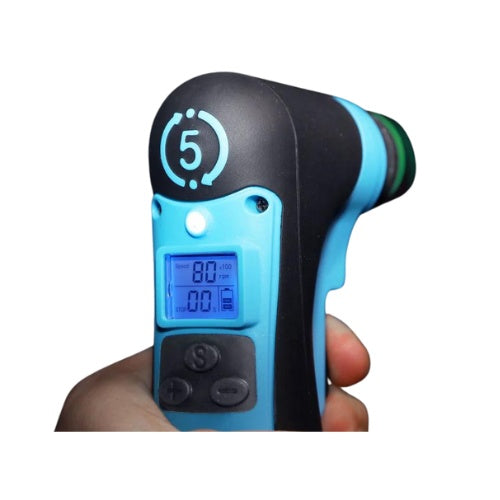 Digital thermometer held in a hand with a white background
