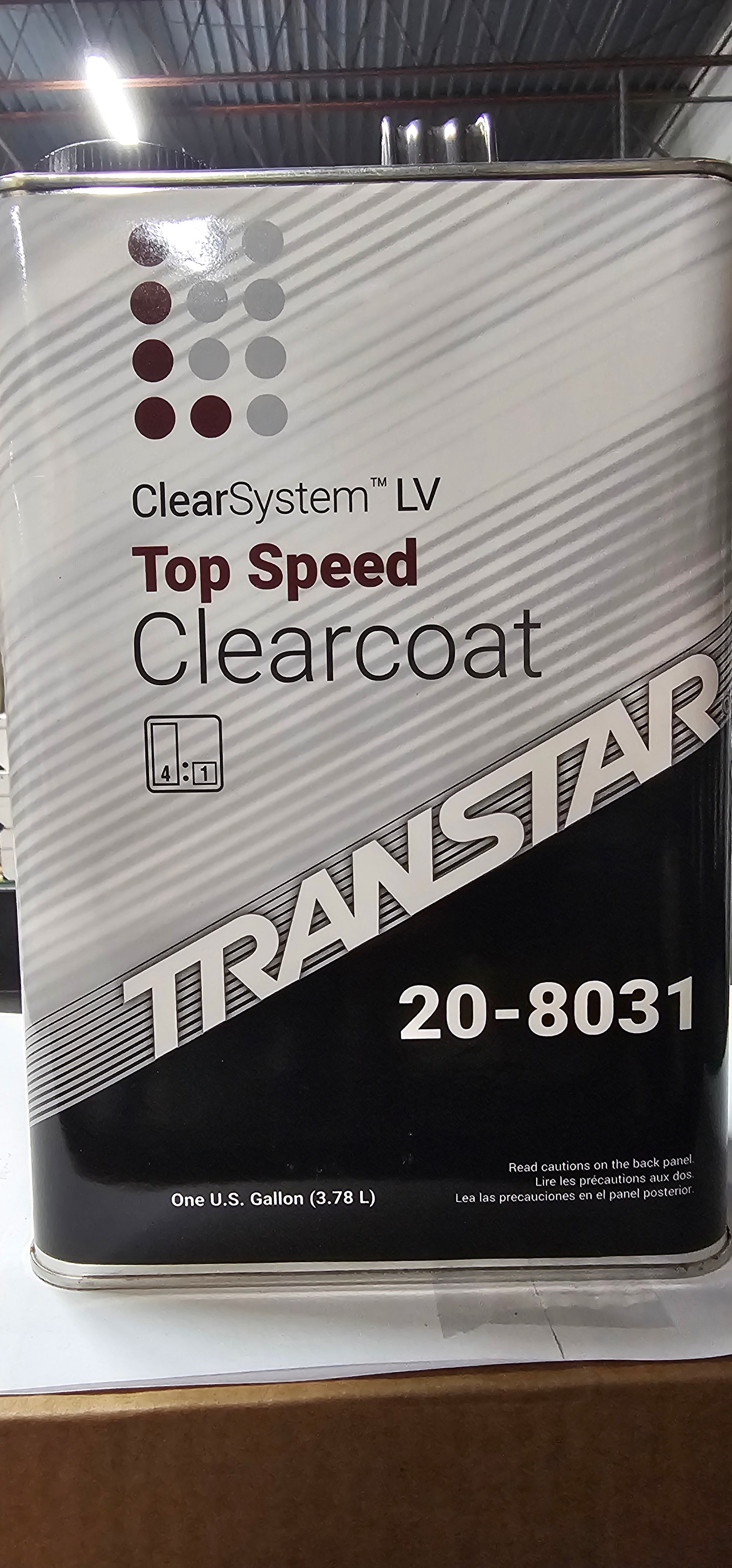 Can of Top Speed Clearcoat with Traxstar branding on a reflective surface