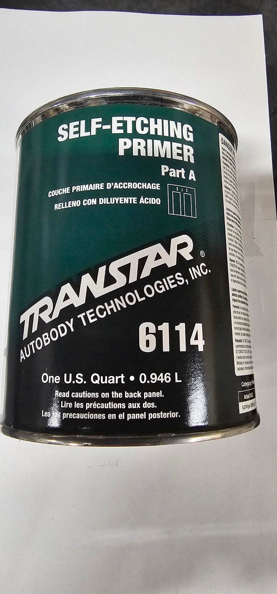 Can of Transtar self-etching primer on a white background