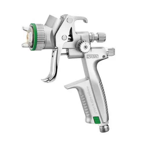 Silver spray gun with green accents on a white background
