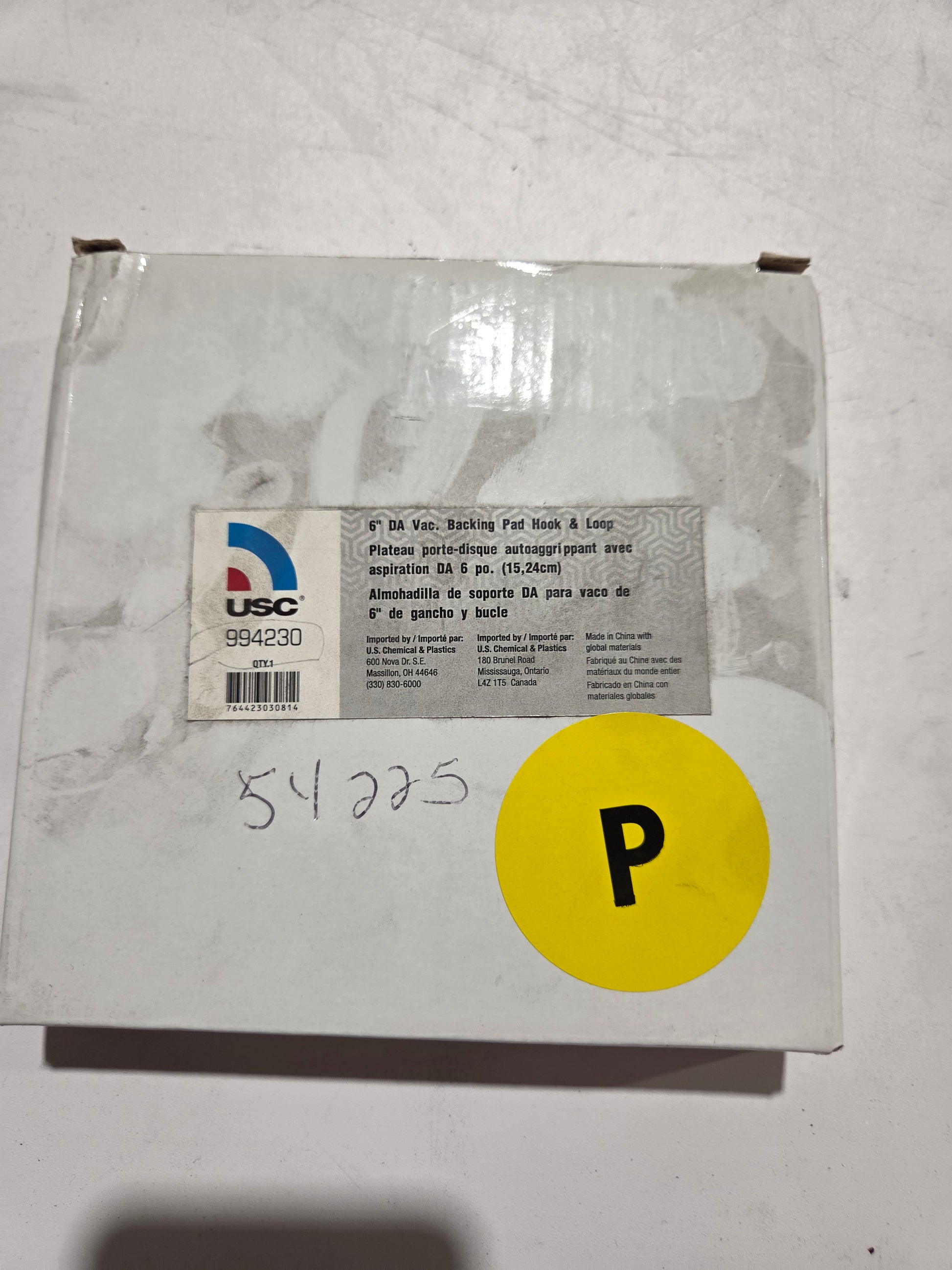 Product packaging with a yellow label and USC logo on a textured surface