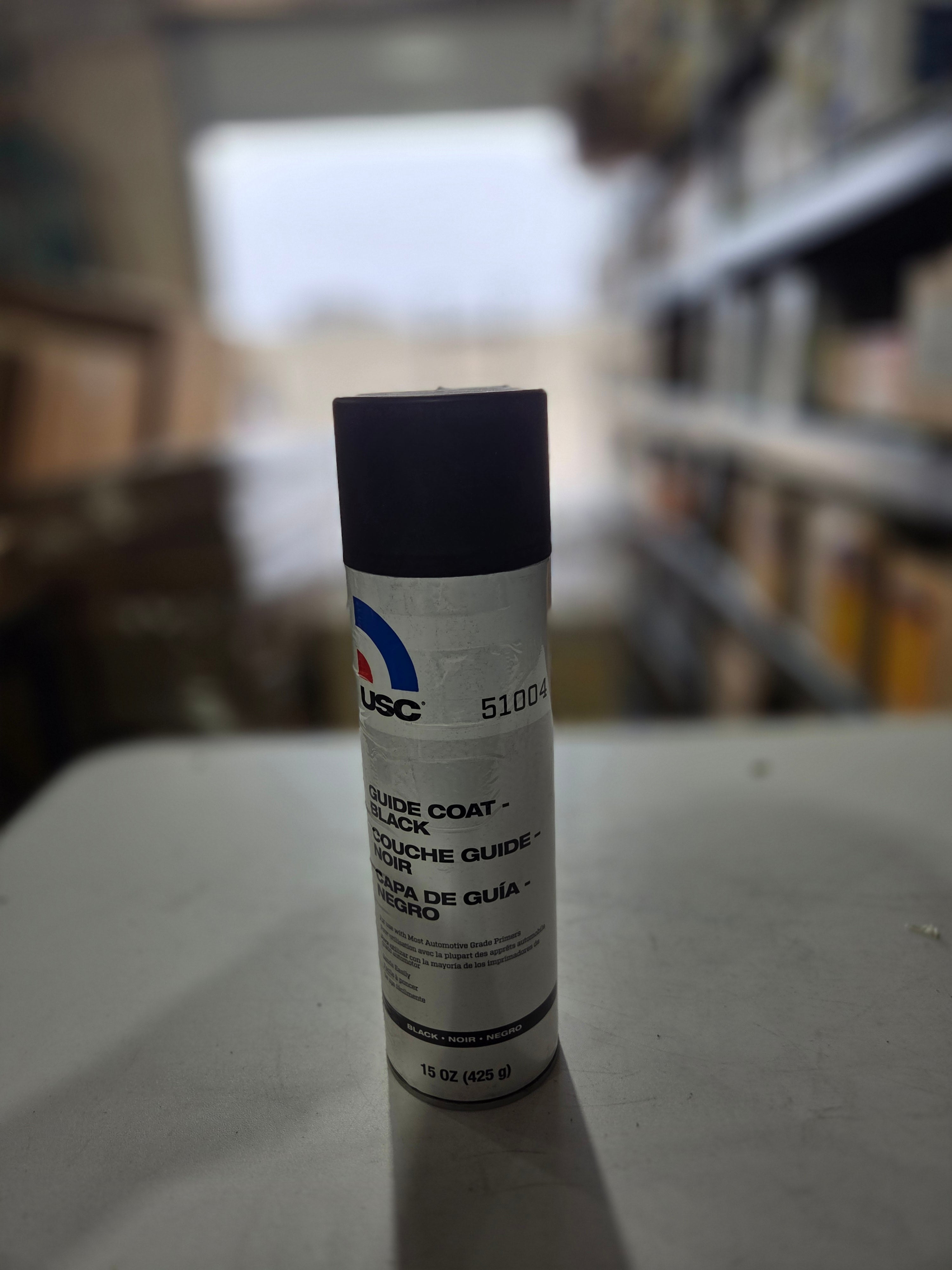 USC tube of paint with a blurred background