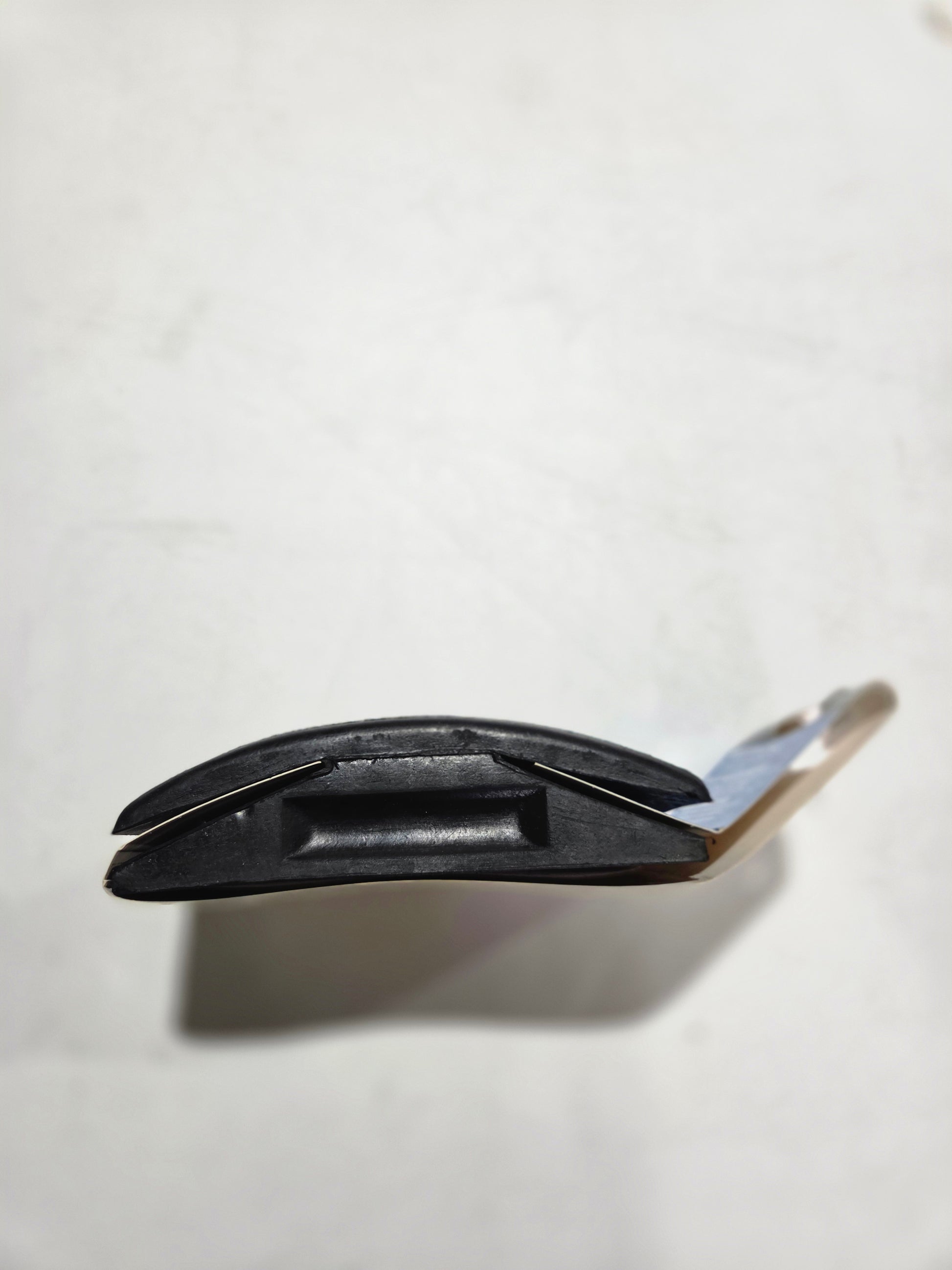Black knife with a silver blade on a white background