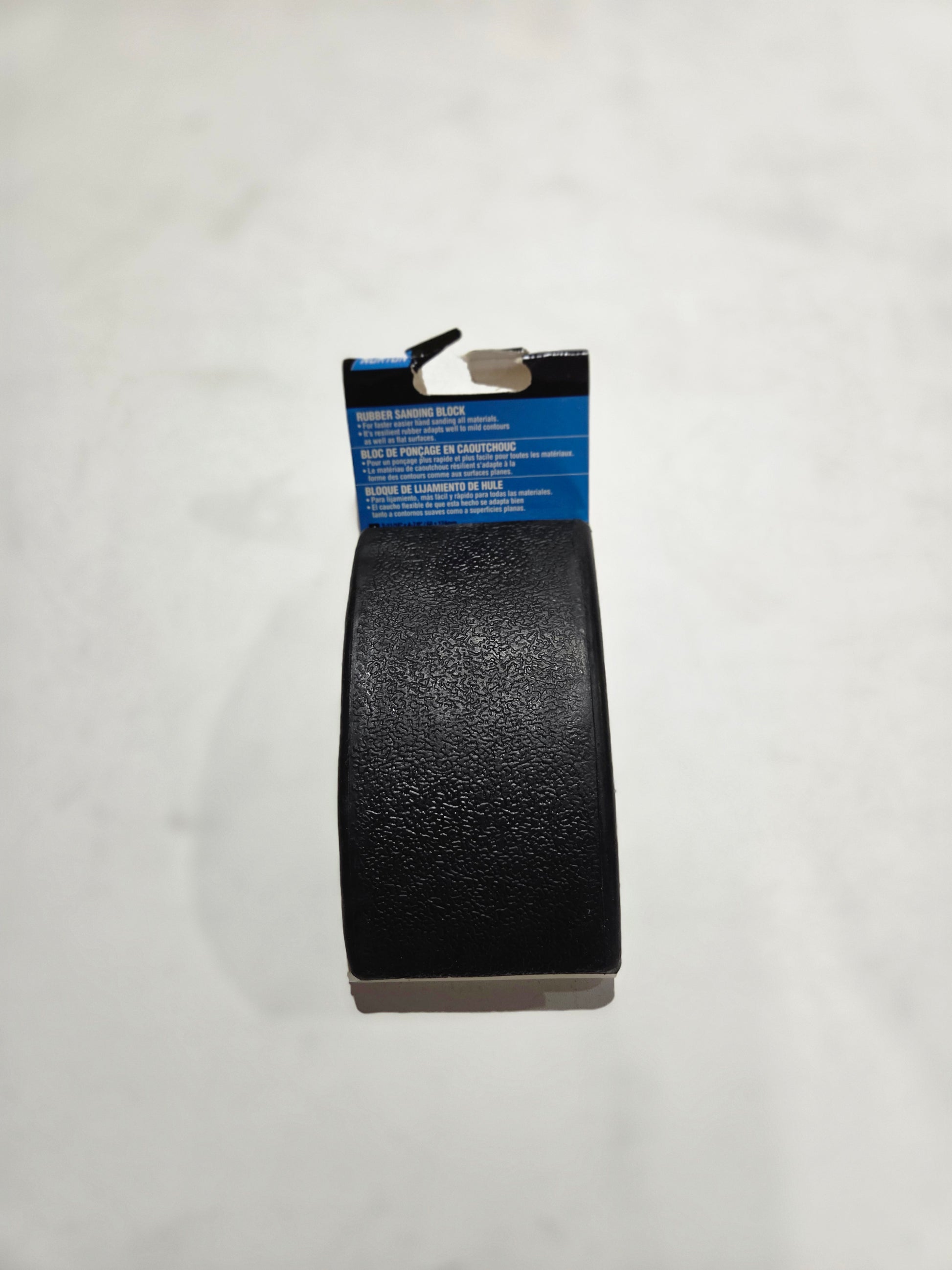 Black belt with blue label on a white background