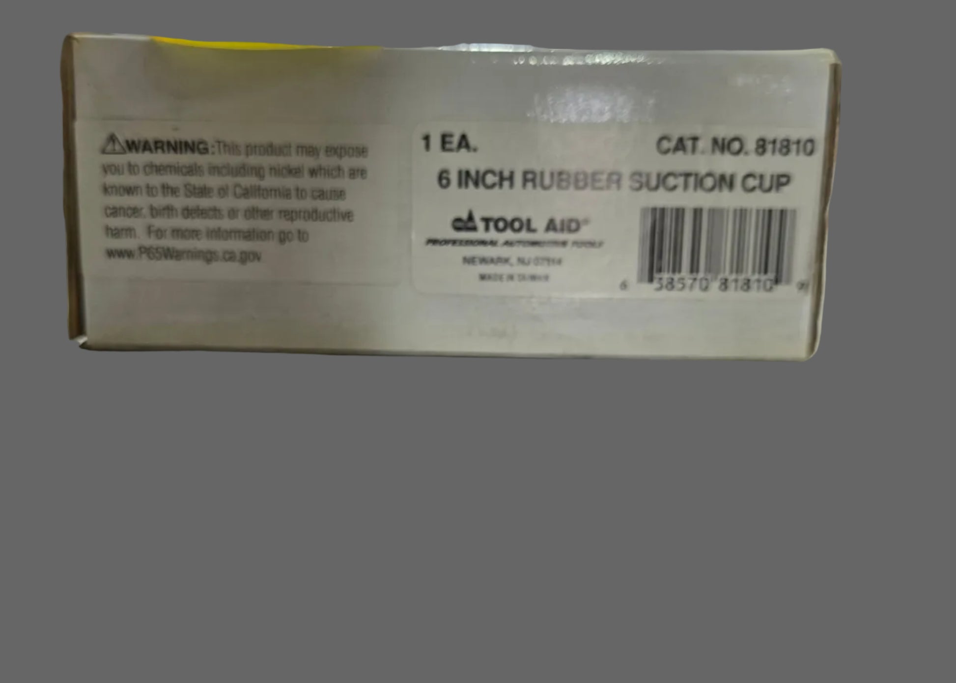 Box with a label on a shelf in a warehouse setting